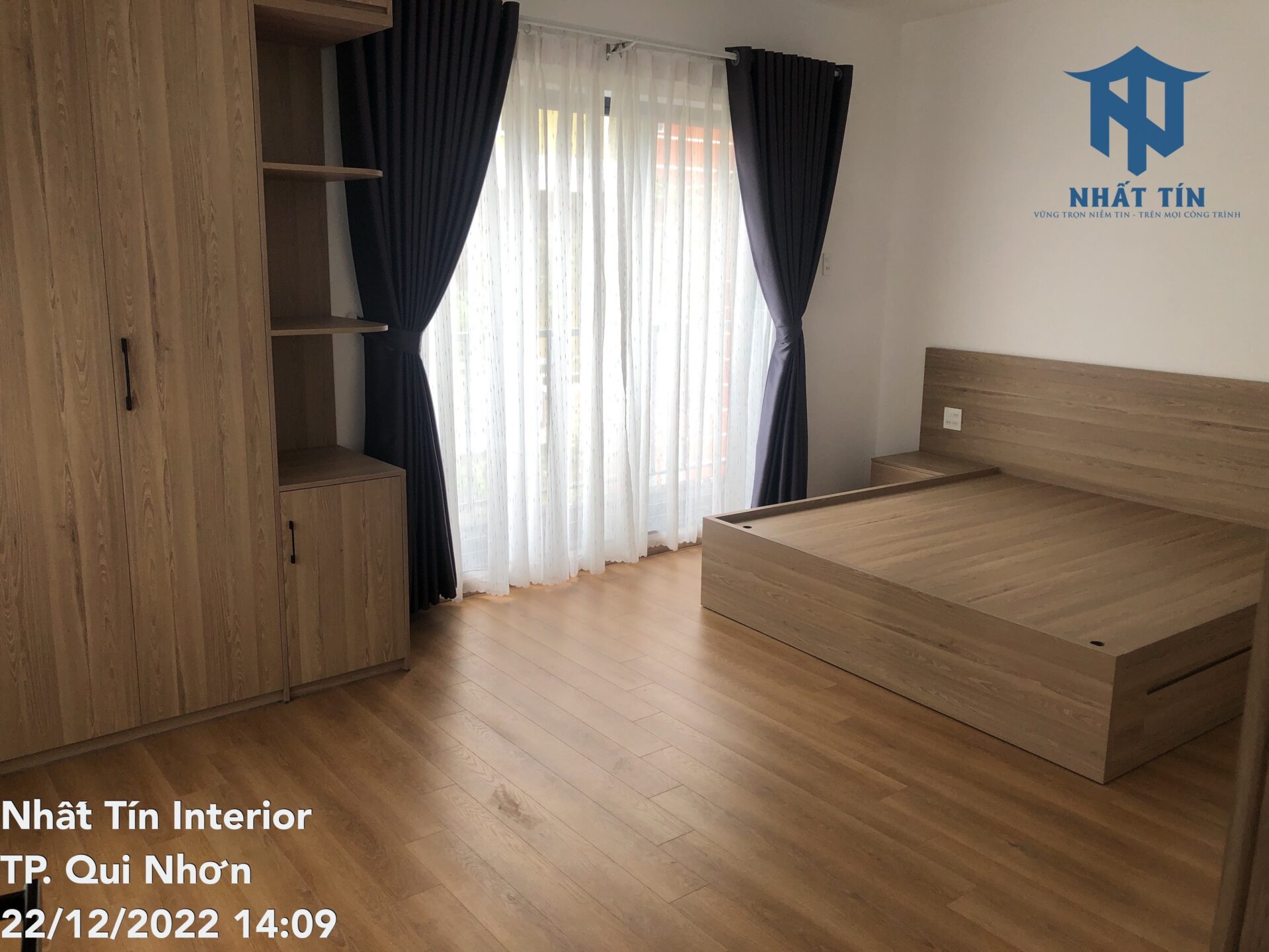 Sàn gỗ giá rẻ Lixson LS1202 lắp đặt tại phòng ngủ